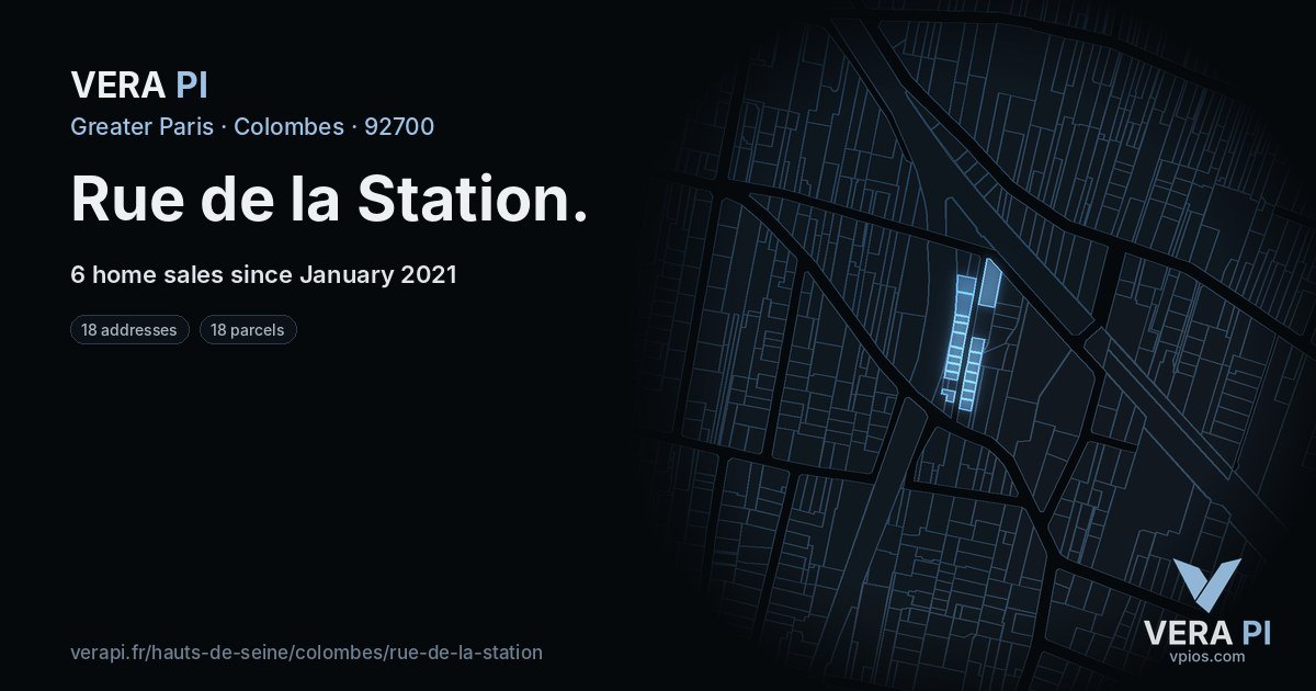 Rue de la Station, Colombes at night – every parcel coloured by the prices around it, the street's own parcels lit