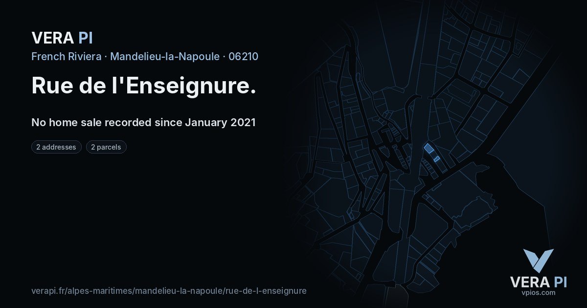 Rue de l'Enseignure, Mandelieu-la-Napoule at night – every parcel coloured by the prices around it, the street's own parcels lit