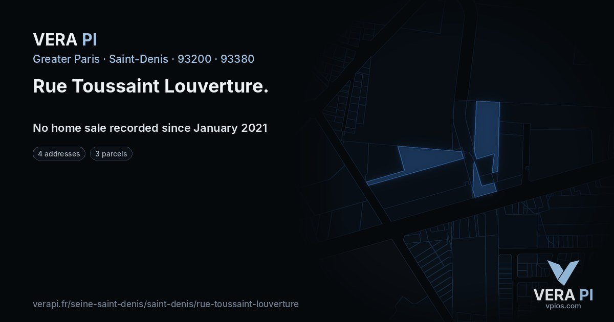 Rue Toussaint Louverture, Saint-Denis at night – every parcel coloured by the prices around it, the street's own parcels lit