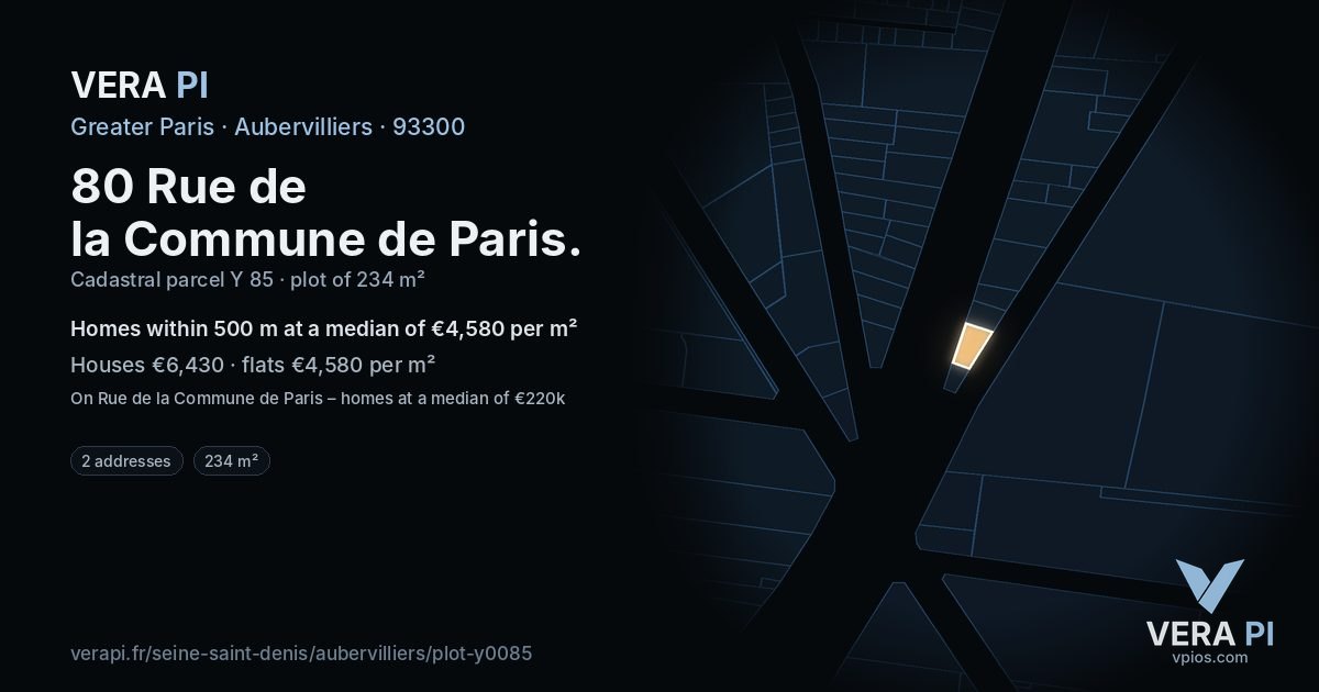80 Rue de la Commune de Paris, Aubervilliers at night – the plot lit, the parcels around coloured by the prices near them