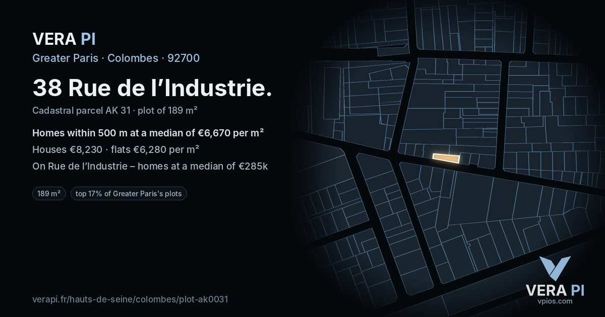 38 Rue de l’Industrie, Colombes at night – the plot lit, the parcels around coloured by the prices near them