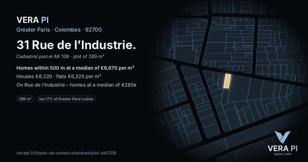 31 Rue de l’Industrie, Colombes at night – the plot lit, the parcels around coloured by the prices near them