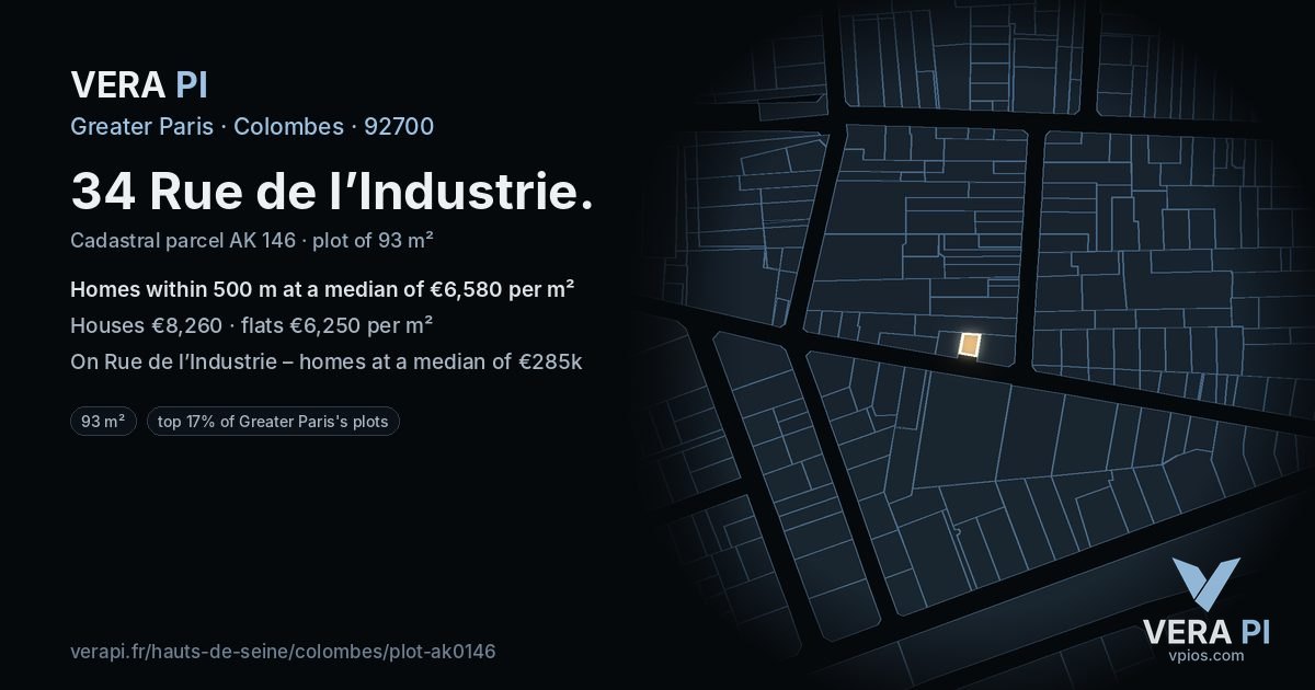 34 Rue de l’Industrie, Colombes at night – the plot lit, the parcels around coloured by the prices near them