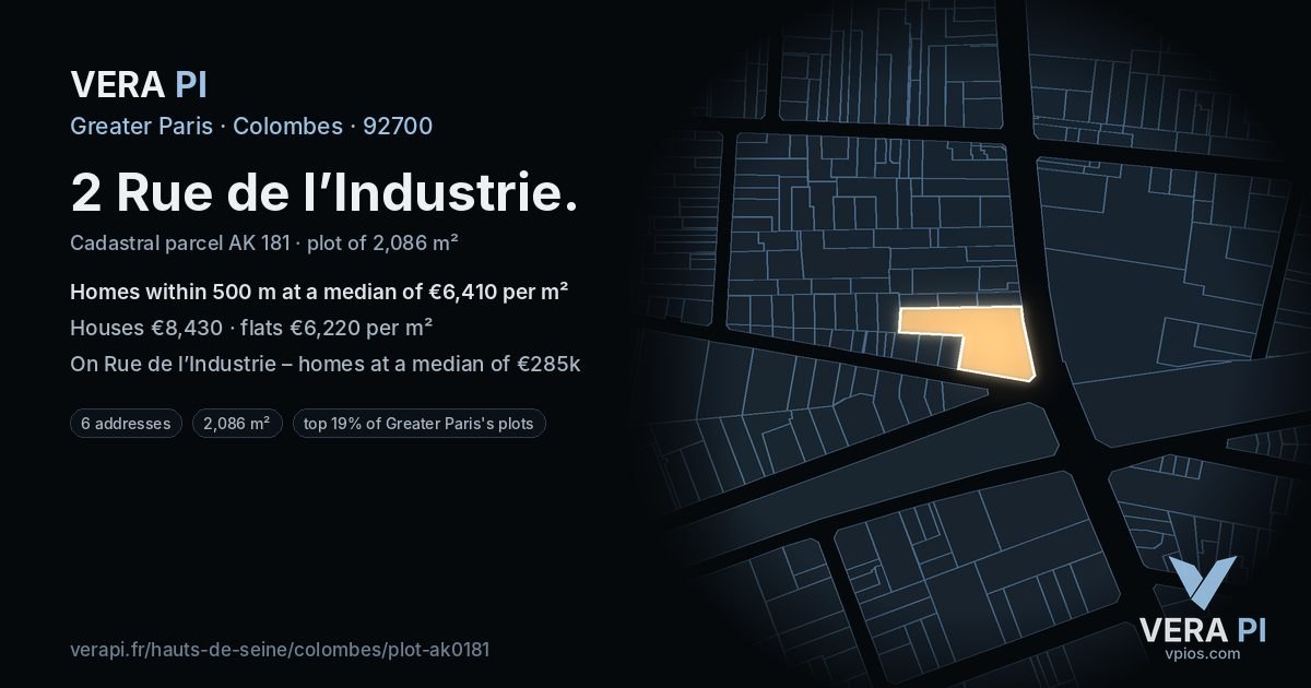 2 Rue de l’Industrie, Colombes at night – the plot lit, the parcels around coloured by the prices near them