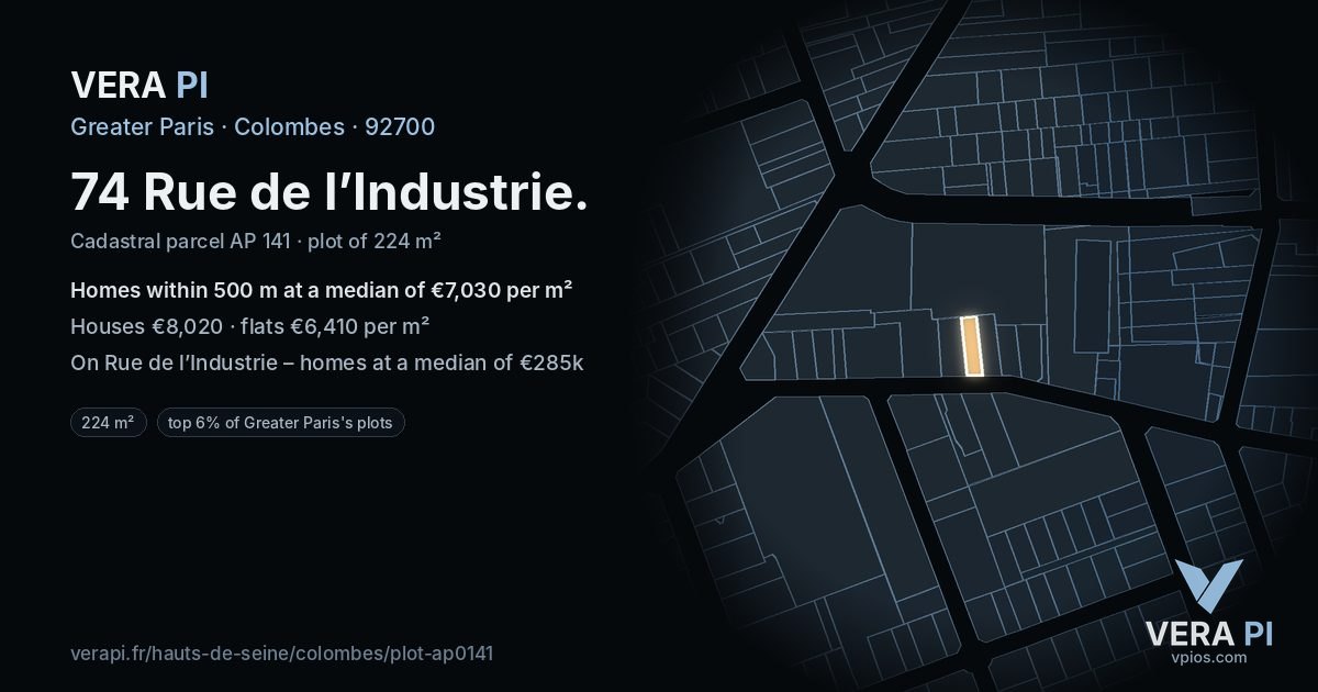 74 Rue de l’Industrie, Colombes at night – the plot lit, the parcels around coloured by the prices near them