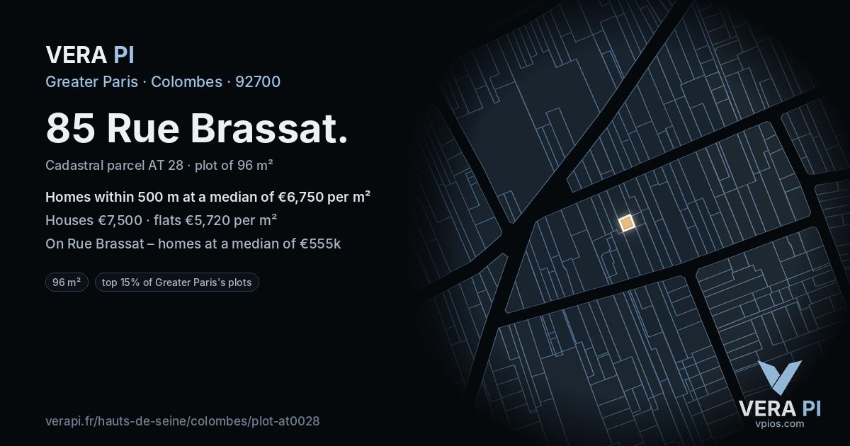 85 Rue Brassat, Colombes at night – the plot lit, the parcels around coloured by the prices near them