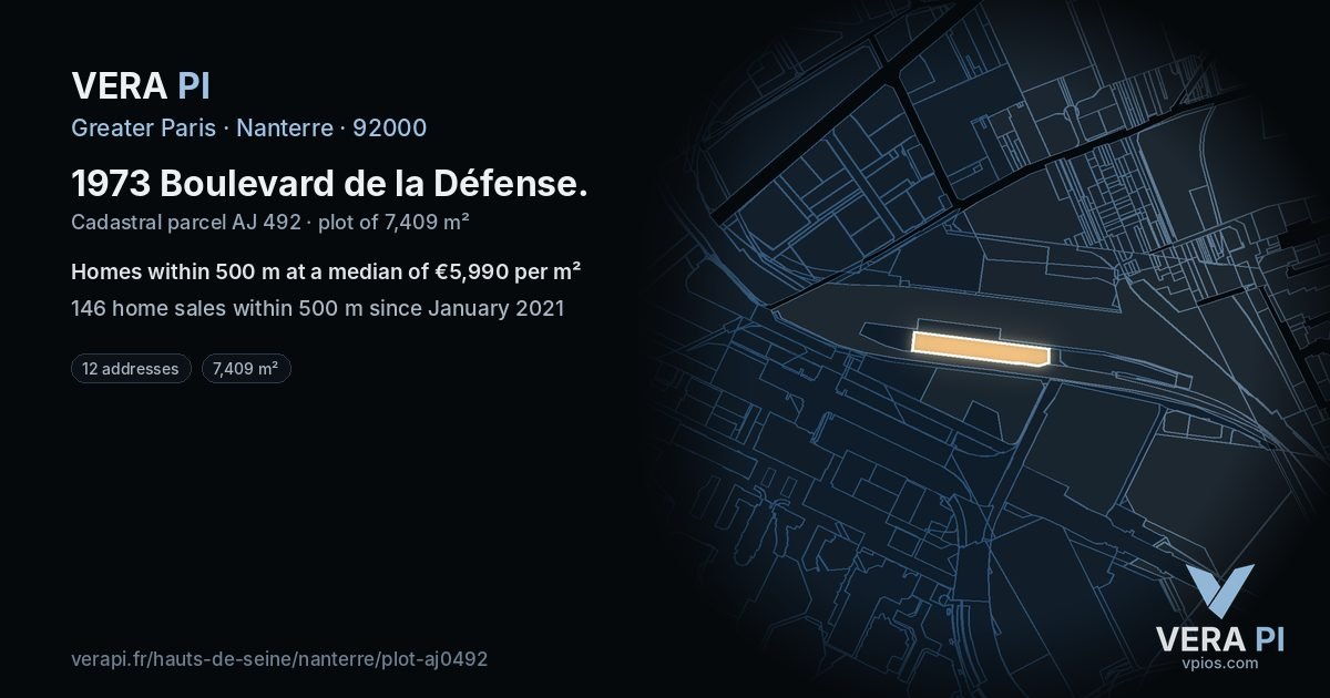 1973 Boulevard de la Défense, Nanterre at night – the plot lit, the parcels around coloured by the prices near them