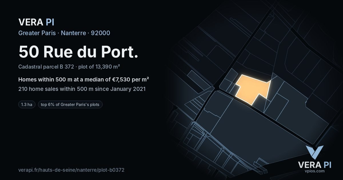 50 Rue du Port, Nanterre at night – the plot lit, the parcels around coloured by the prices near them