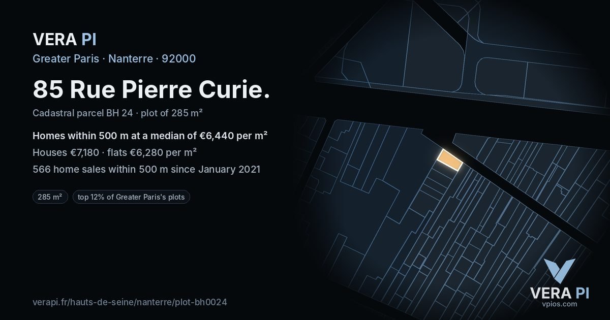 85 Rue Pierre Curie, Nanterre at night – the plot lit, the parcels around coloured by the prices near them