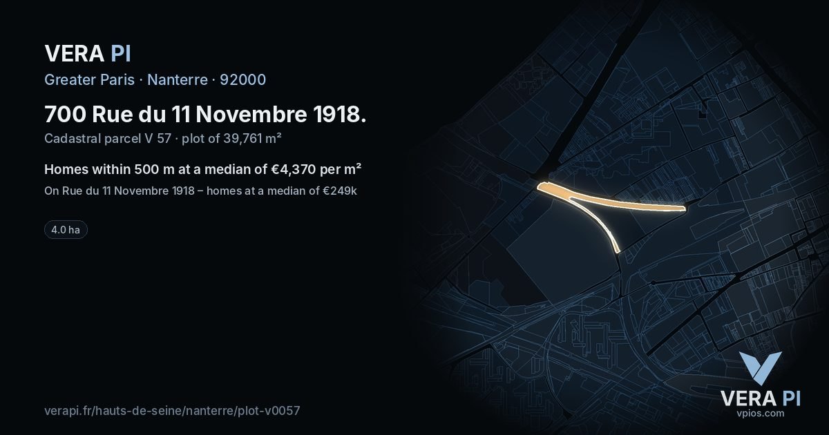 700 Rue du 11 Novembre 1918, Nanterre at night – the plot lit, the parcels around coloured by the prices near them