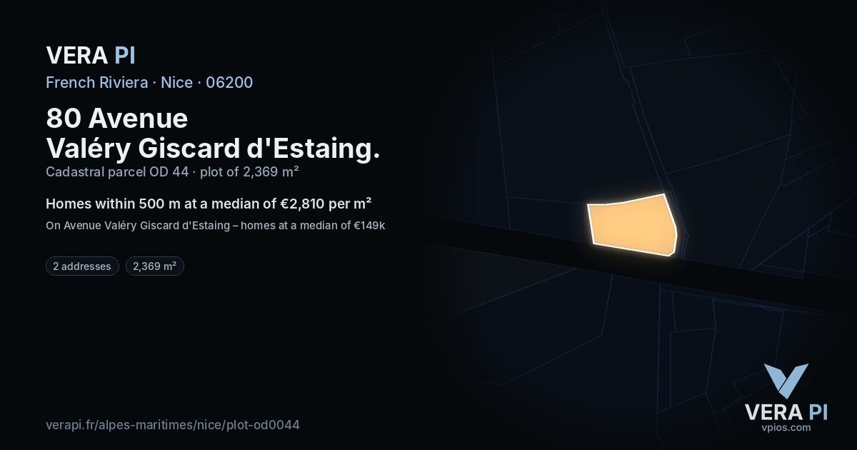 80 Avenue Valéry Giscard d'Estaing, Nice at night – the plot lit, the parcels around coloured by the prices near them